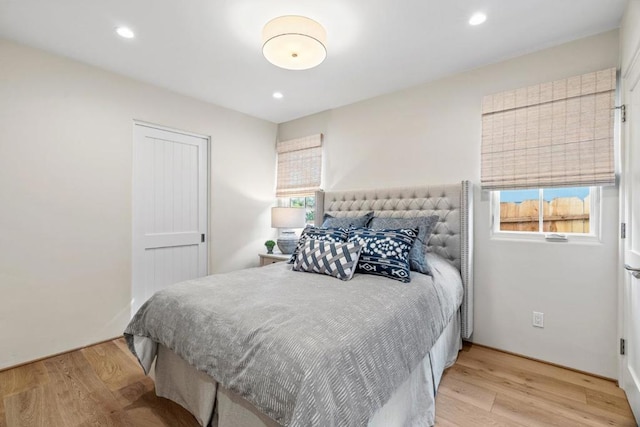 bedroom featuring light wood-type flooring