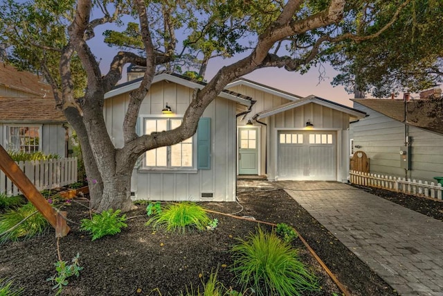 view of front of home with a garage