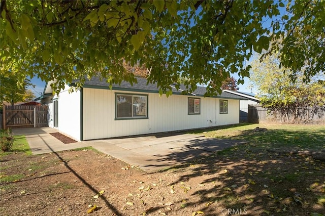 back of house featuring a patio area