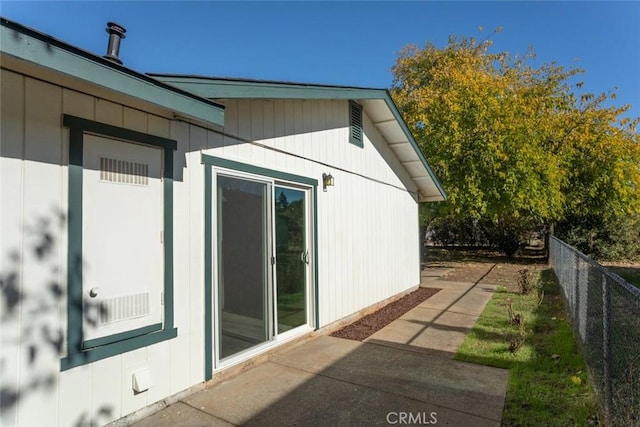 view of property exterior with a patio