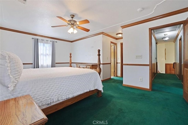 bedroom featuring ceiling fan, dark carpet, and crown molding