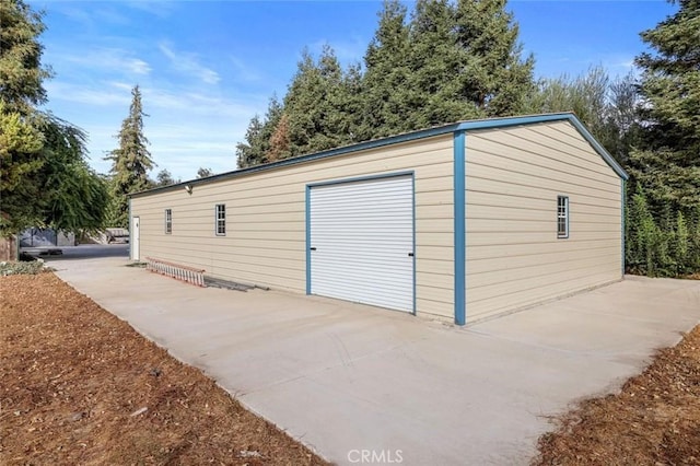 view of outdoor structure featuring a garage