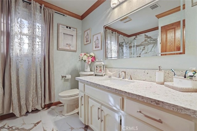 bathroom with a shower with curtain, vanity, toilet, and crown molding