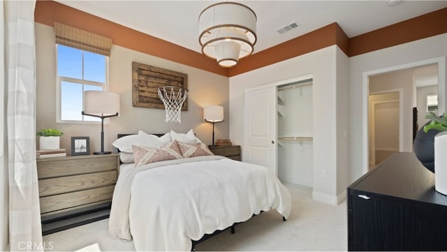 carpeted bedroom with a closet