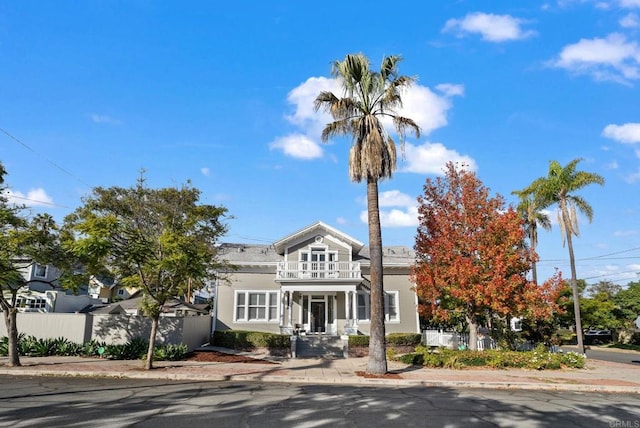 view of front of home featuring a balcony