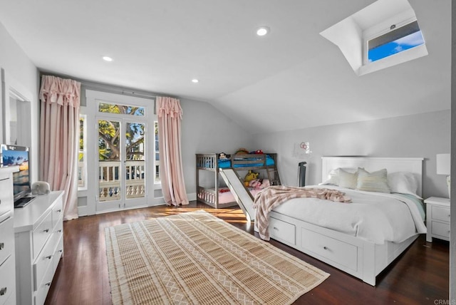 bedroom with dark hardwood / wood-style flooring, access to outside, and vaulted ceiling