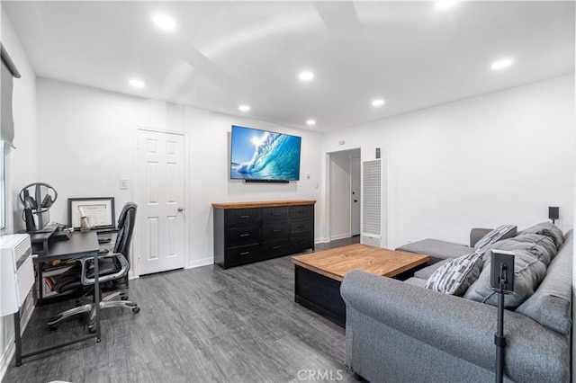 office space with dark wood-type flooring