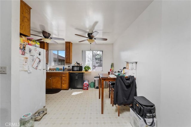 kitchen featuring white fridge