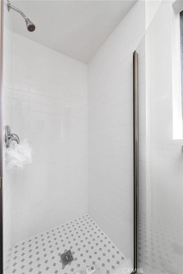 bathroom featuring a shower stall