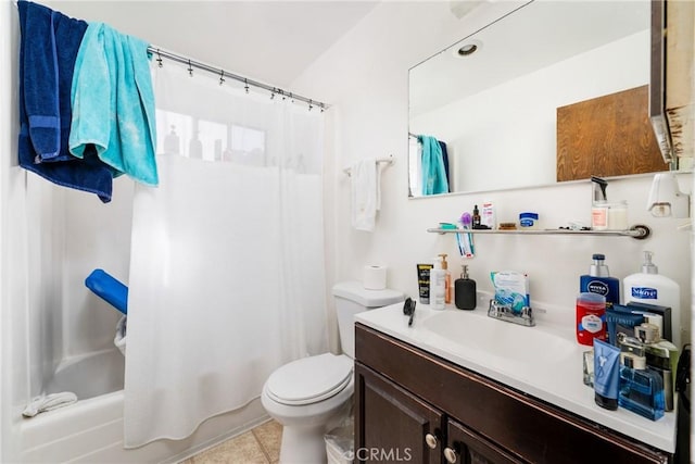 full bathroom with vanity, shower / bath combination with curtain, tile patterned floors, and toilet