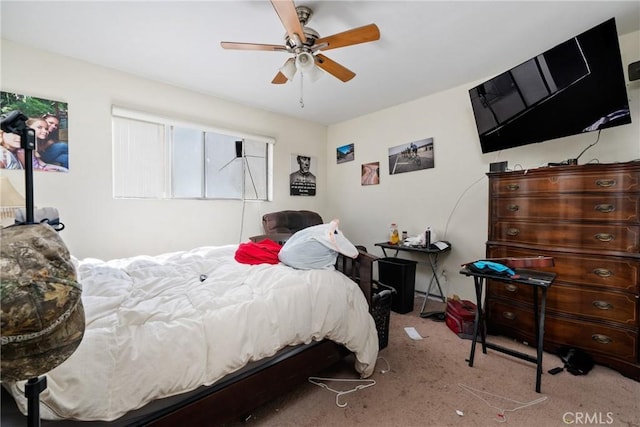 carpeted bedroom featuring a ceiling fan