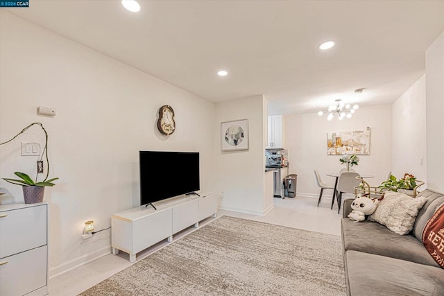 living room featuring a chandelier