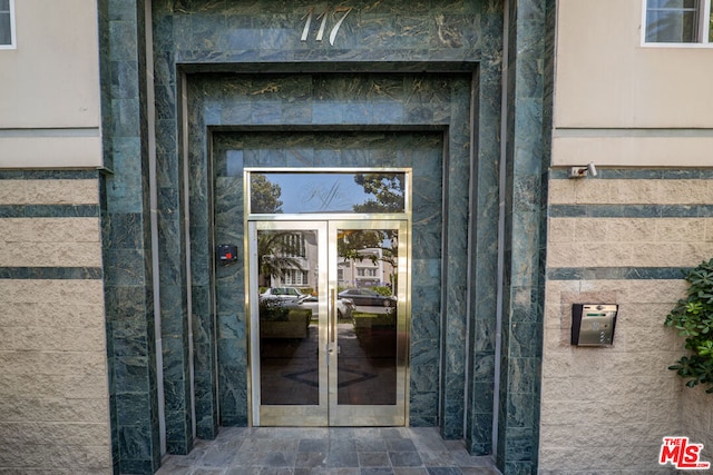 entrance to property with french doors