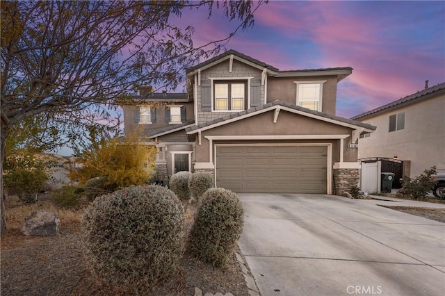 view of front of property featuring a garage