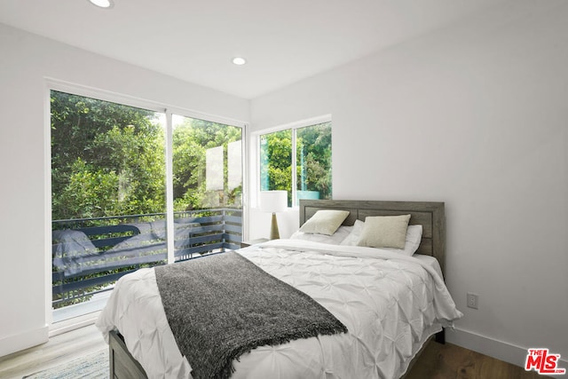 bedroom featuring wood-type flooring