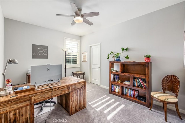 office with ceiling fan and light colored carpet