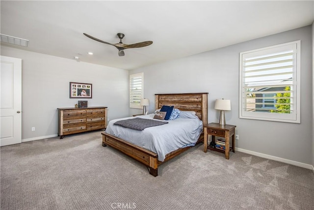 carpeted bedroom featuring ceiling fan