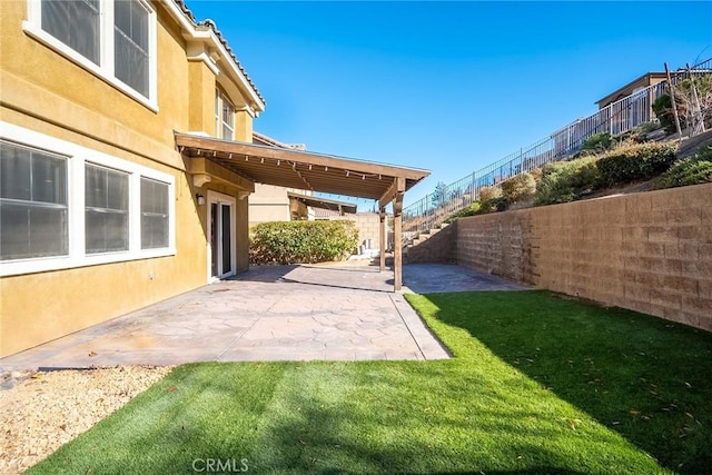 view of yard with a patio area