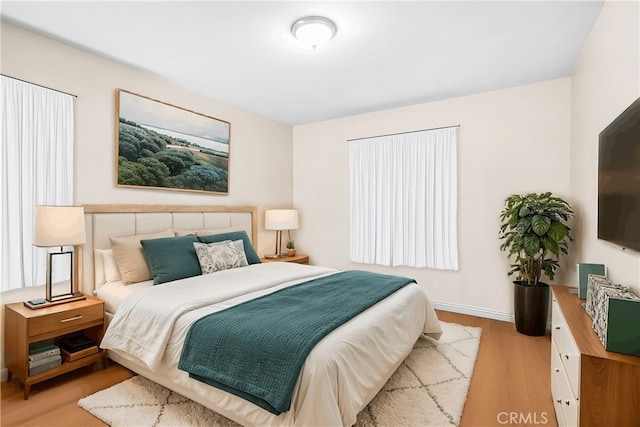 bedroom featuring light hardwood / wood-style floors