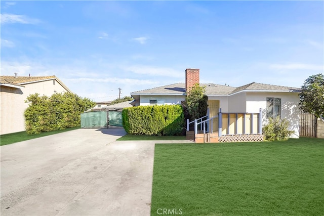 exterior space with a front yard