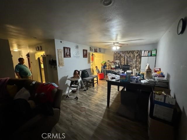 interior space featuring hardwood / wood-style flooring and ceiling fan