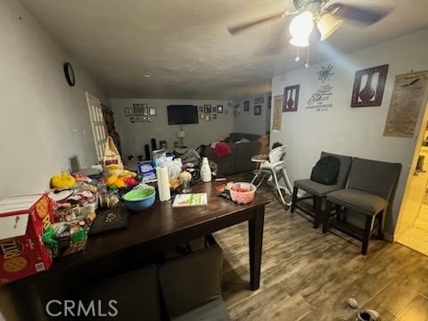 dining area featuring ceiling fan and hardwood / wood-style flooring