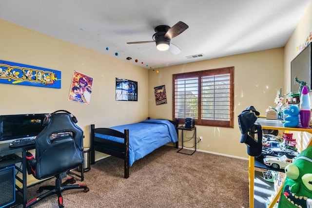 carpeted bedroom featuring ceiling fan