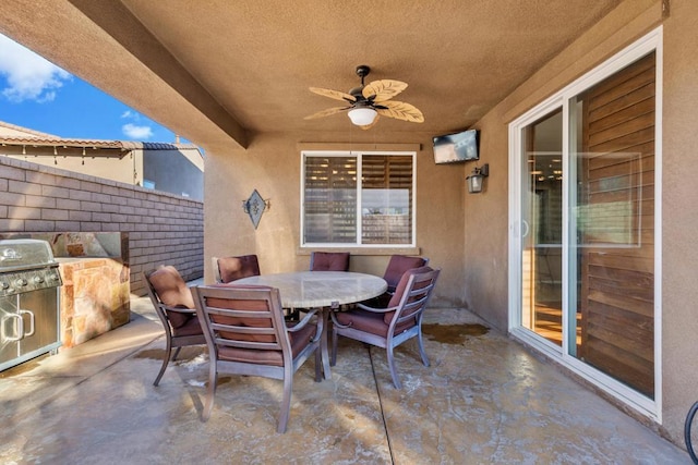 view of patio featuring ceiling fan and area for grilling