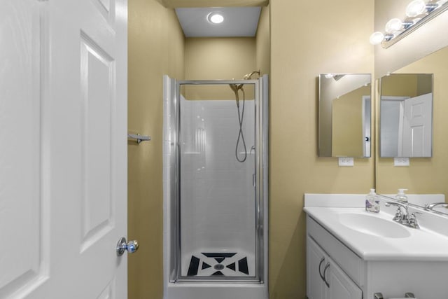 bathroom featuring vanity and walk in shower