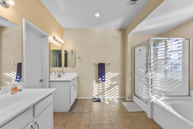 bathroom with vanity, tile patterned floors, and independent shower and bath