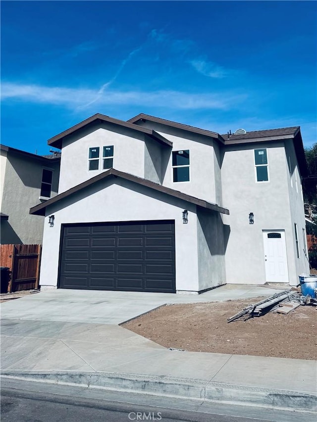 view of front of property featuring a garage