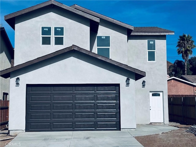 view of front of home featuring a garage