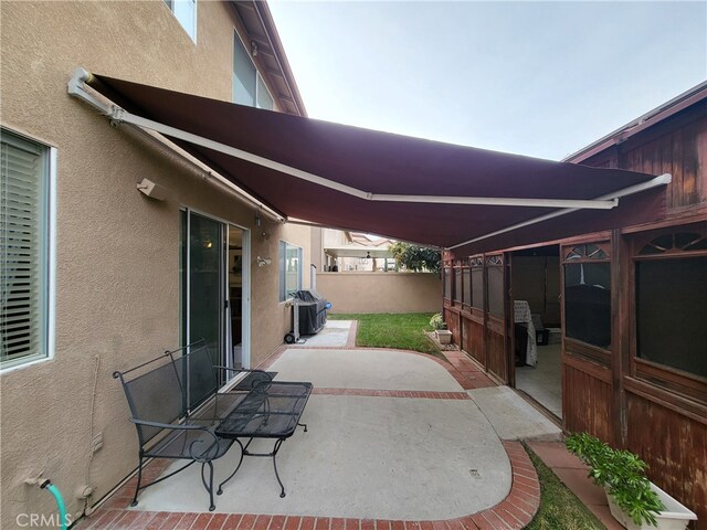 view of patio / terrace with a grill