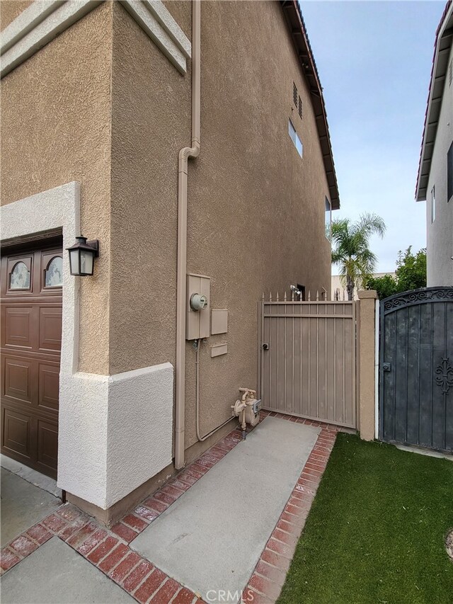 view of side of property featuring a garage