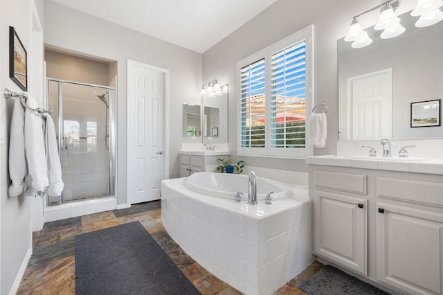 bathroom with shower with separate bathtub and vanity