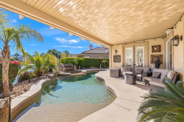 view of swimming pool featuring a patio and outdoor lounge area