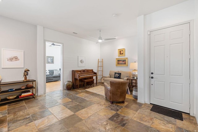 entryway featuring ceiling fan