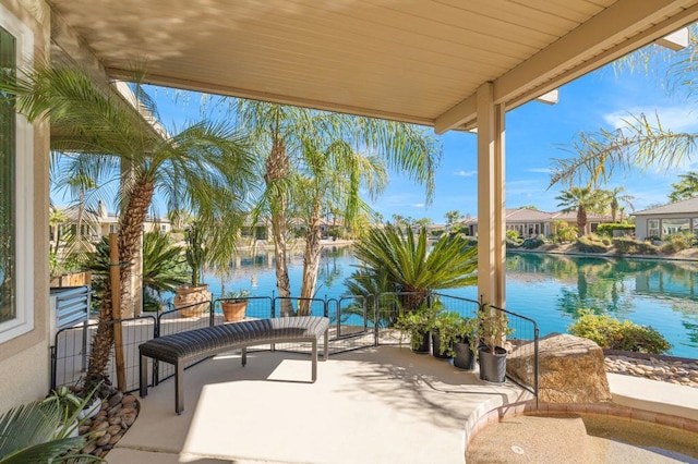 view of patio featuring a water view