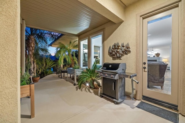 view of patio featuring a grill