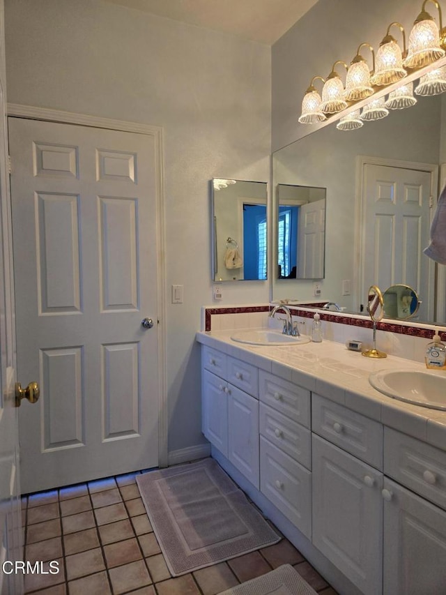 bathroom with vanity and tile patterned floors