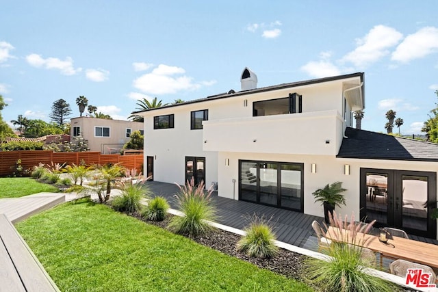 exterior space featuring french doors and a front yard