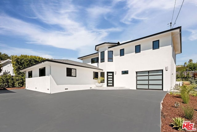 contemporary house featuring a garage