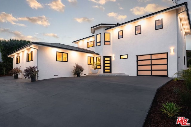 contemporary home with a garage