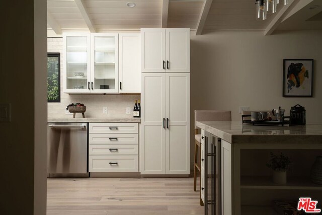 bar featuring beam ceiling, white cabinetry, dishwasher, and light wood-type flooring