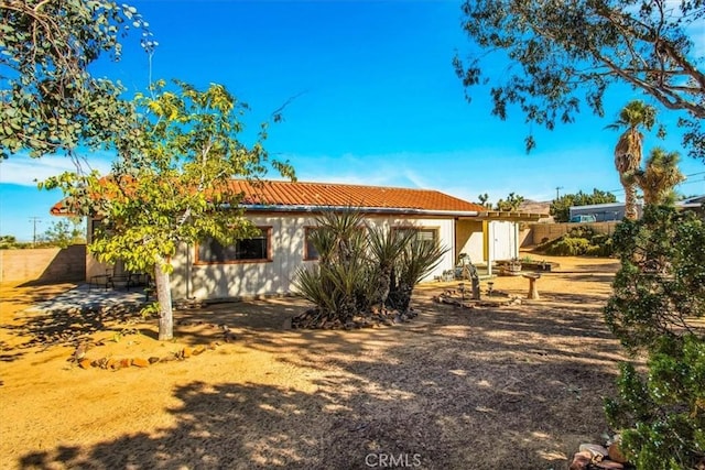 rear view of house with a patio area