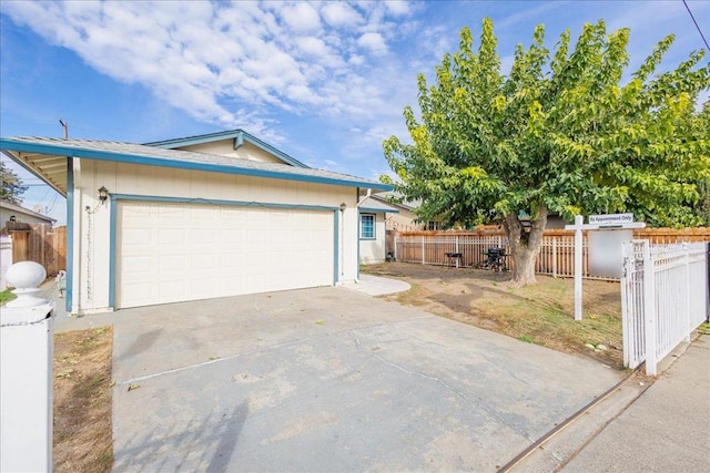 ranch-style home with a garage