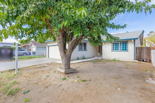 ranch-style home with a garage