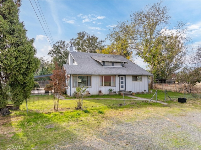 view of front of home with a front yard