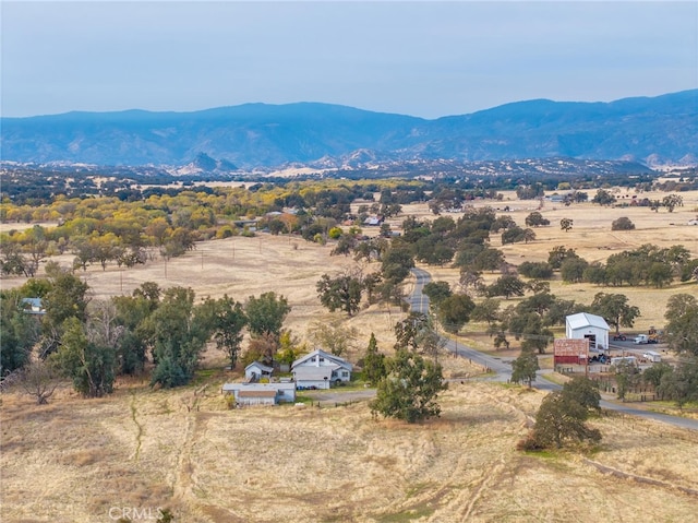 aerial view featuring a mountain view and a rural view