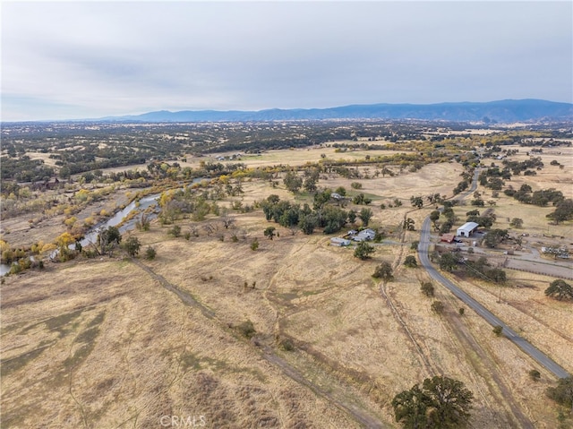 aerial view featuring a mountain view and a rural view